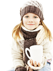 Smiling little girl with a white cup of hot drink.