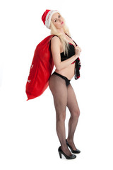 Sexy young woman with Christmas sack isolated