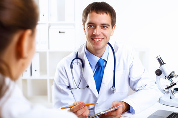 Friendly doctor in medical office