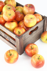 Wooden box full of apples