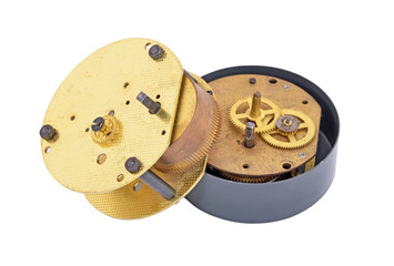 Inside the clock (watchwork), antique vintage clock mechanism