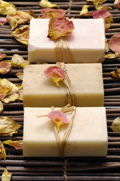 natural handmade soap with rose petals on mat