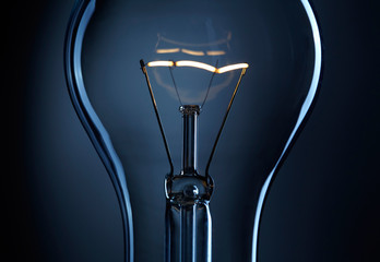 Light bulb over dark background