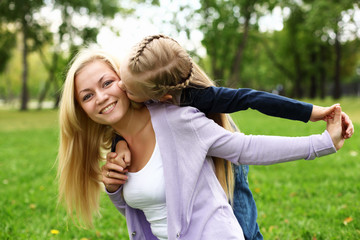 Mother and daughter in park