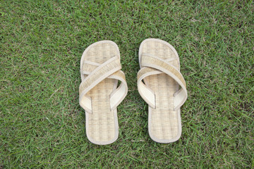 handmade slipper on grass