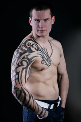 Fototapeta premium Muscular Sexy Man with tattoo