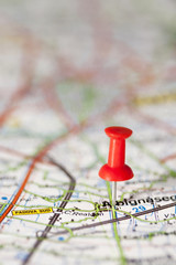 Push pin stuck in a map