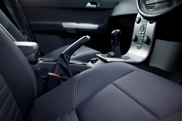 Modern car interior (shallow DOF - selective focus; color toned - obrazy, fototapety, plakaty