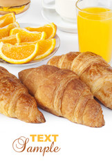 croissant bun with orange juice