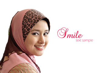 Beautiful Muslim woman was glanced with sweet smile