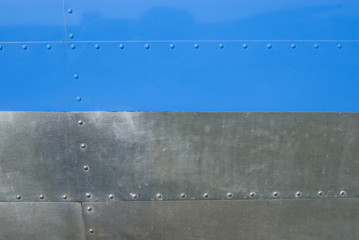 Metal texture with rivets