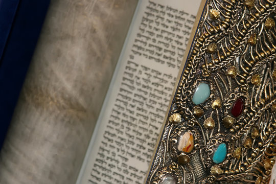 Beautifully decorated Torah scroll.