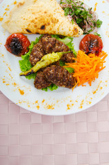 Meat cuisine - kebab served in plate