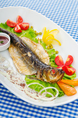 Fried fish in the plate