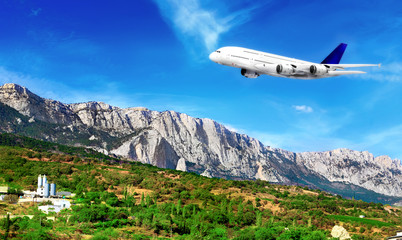 Fototapeta premium Modern airplane in South part of Crimea.