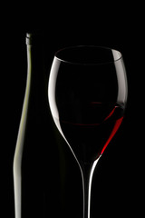 red wine glass isolated on black background
