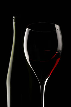 red wine glass isolated on black background