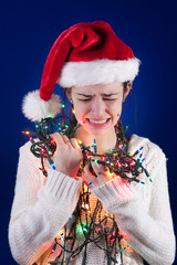 Panicked girl with Christmas lights