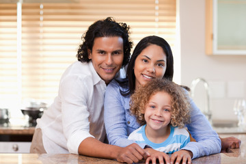 Family together in the kitchen