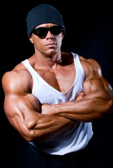 Fototapeta premium strong athletic man in dark glasses
