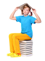 Cute schoolgirl with book.