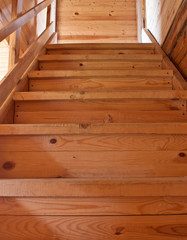 Fototapeta na wymiar Wooden stairs in a house