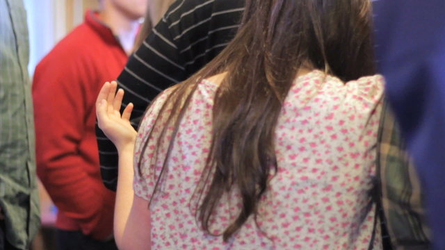 Girl Praying At A Prayer Meeting
