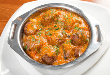 meatballs in tomato sauce on a plate