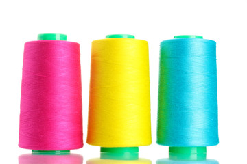 Bobbins of thread isolated on white