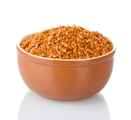 Raw buckwheat isolated on white