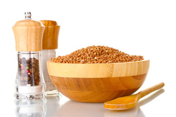 Raw buckwheat isolated on white