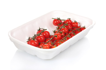 cherry tomatoes in packaging isolated on white