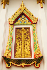 Gold carved ancient Window of temple