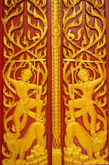 Gold carved ancient doors of temple 2