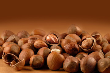 nuts  on a brown background