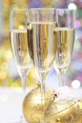 Champagne glass with Christmas ball (shallow dof