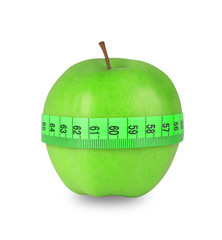 Green apple with tape measure