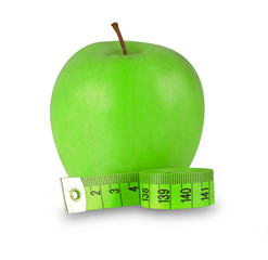Green apple with tape measure