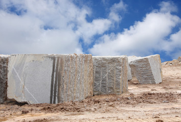 Granite blocks extracted through wire rope & blasting techniques