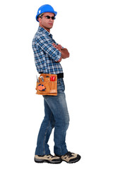 Confident entrepreneur standing on white background