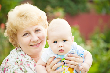 Happy grandmother and baby