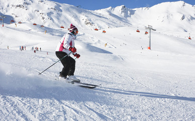 Fototapeta na wymiar The woman is skiing at a ski resort Solden