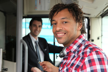 Man paying for bus ticket © auremar