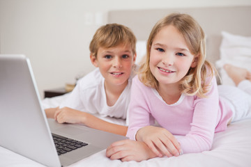 Cute children using a notebook