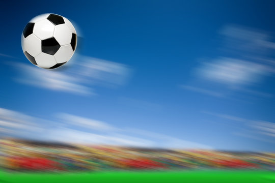 a soccer ball flying