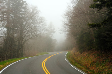 Mountain road in the mist