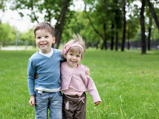 Fototapeta premium happy sister and brother outdoors