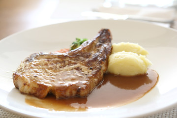 Steak on wood background