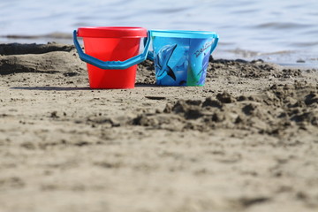 Fototapeta na wymiar buckets on the beach