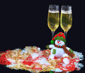 Glasses of champagne with snowmen, decorated,